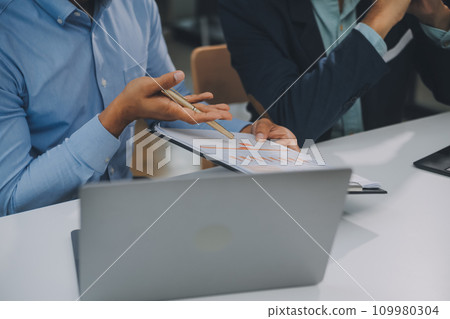 Group of business people working together in the office new concept business project presentation ideas. Group of business people working together in the office new concept business project presentation ideas. 109980304