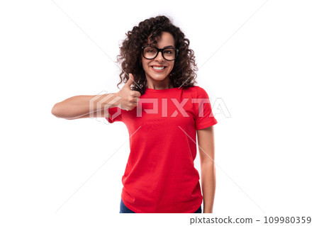 caucasian young energetic curly brunette woman in red casual t-shirt caucasian young energetic curly brunette woman in red casual t-shirt 109980359