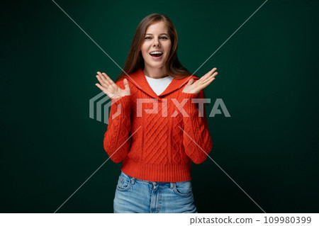 Cheerful 30 year old woman with brown hair smiles with enthusiasm 109980399