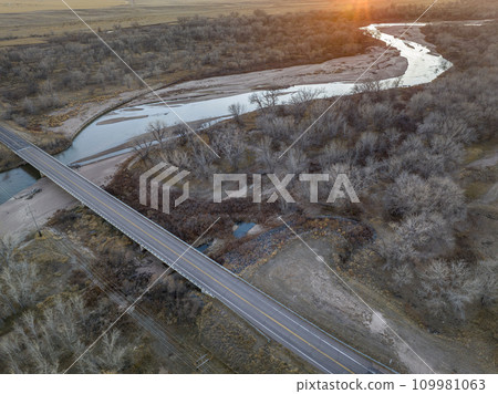 sunset over the South Platte River in eastern Colorado near Crook, aerial view of late November scenery 109981063