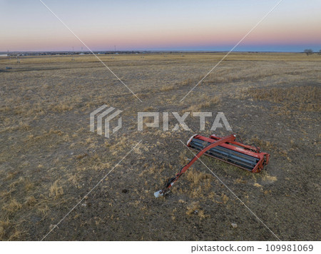 dusk over prairie and farmland in a valley of the South Platte River in eastern Colorado near Crook, aerial view of late November scenery dusk over prairie and farmland in a valley of the South Platte River in eastern Colorado near Crook, aerial view of late November scenery 109981069