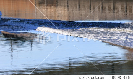 Boat ripple image Boat ripple image 109981436