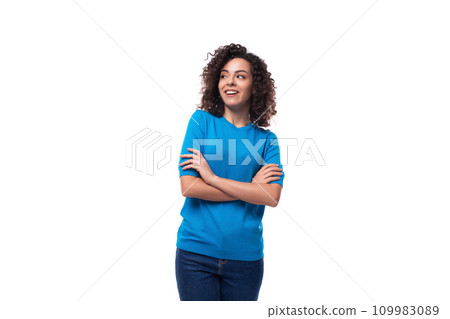 portrait of a young confident woman in a blue sweater with short sleeves on a white background portrait of a young confident woman in a blue sweater with short sleeves on a white background 109983089