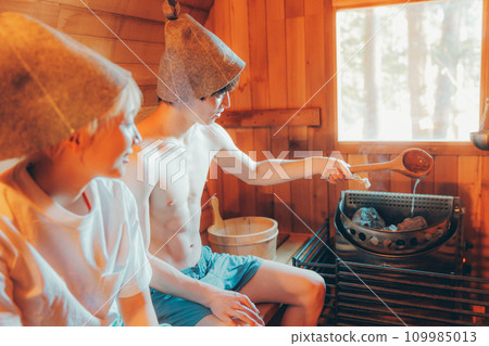 Men and women entering the sauna 109985013