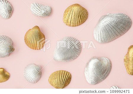 Shined cockle shells collection on pink. Shined cockle shells collection on pink. 109992471