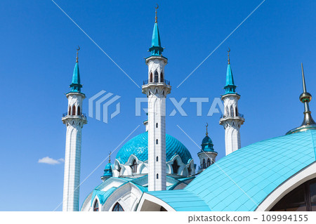 Roof and minarets of the Kul Sharif Mosque is under blue sky on a sunny day. Kazan 109994155