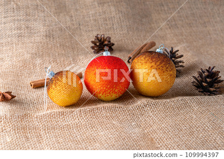 Exquisite handmade Christmas bubble toy from beads, also known as a Christmas globe or Christmas bulb, is a part of holiday decor 109994397