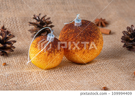 Exquisite handmade Christmas bubble toy from beads, also known as a Christmas globe or Christmas bulb, is a part of holiday decor Exquisite handmade Christmas bubble toy from beads, also known as a Christmas globe or Christmas bulb, is a part of holiday decor 109994409
