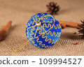 Exquisite handmade Christmas bubble toy from beads, also known as a Christmas globe or Christmas bulb, is a part of holiday decor 109994527