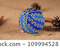 Exquisite handmade Christmas bubble toy from beads, also known as a Christmas globe or Christmas bulb, is a part of holiday decor 109994528