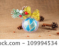 Exquisite handmade Christmas bubble toy from beads, also known as a Christmas globe or Christmas bulb, is a part of holiday decor 109994534
