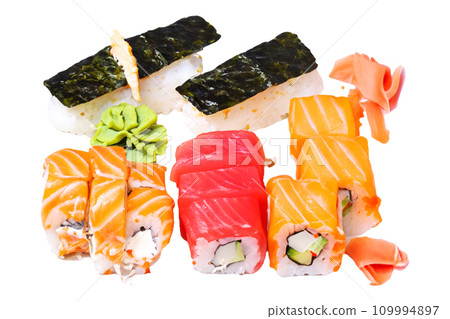 sushi on a white background. sushi is sometimes confused with sashimi, a dish that consists of thinly sliced raw fish or occasionally meat, without sushi rice 109994897