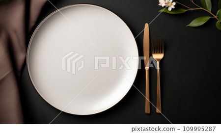 Clean empty white plate with knife and fork Clean empty white plate with knife and fork 109995287