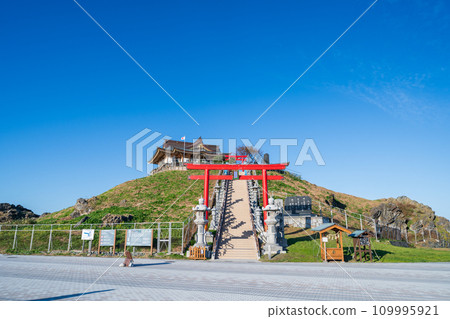 ``Aomori Prefecture'' Kabushima Shrine and Hachinohe City shine under a clear sky 109995921