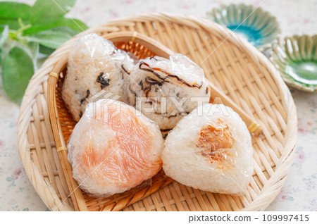 Rice balls wrapped in plastic wrap Rice balls wrapped in plastic wrap 109997415