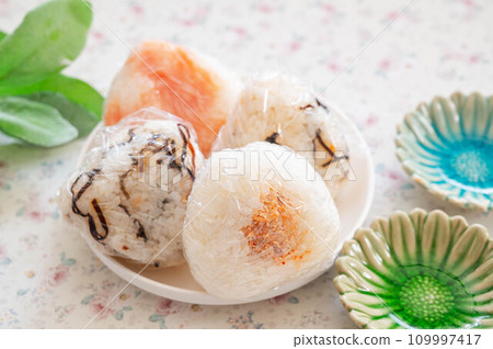 Rice balls wrapped in plastic wrap Rice balls wrapped in plastic wrap 109997417
