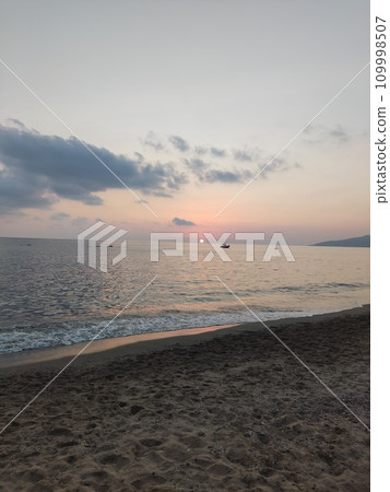 Panorama of an amazing sunset over the sea off the coast of Ascea, town in the province of Salerno in the Campania region of southwestern Italy, part of the Cilento traditional area Panorama of an amazing sunset over the sea off the coast of Ascea, town in the province of Salerno in the Campania region of southwestern Italy, part of the Cilento traditional area 109998507