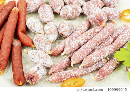 Salami on a plate, Italian salami. 109999045