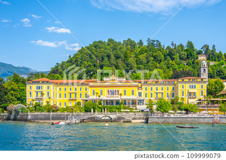 Bellagio town at Como Lake on sunny summer day. Idyllic view from ferry. Lombardy, Italy 109999079