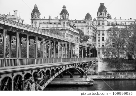 Promenade Jean-Paul Belmondo on historical Bir Hakeim Bridge in Paris, France. Black and white image. Promenade Jean-Paul Belmondo on historical Bir Hakeim Bridge in Paris, France. Black and white image. 109999085