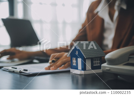 buy or sell real estate mortgage, Sale representative offer house purchase contract to buy a house or apartment and mortgage Money and Financial Concepts 110002235