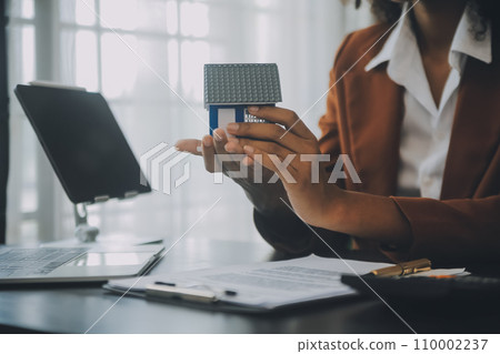 buy or sell real estate mortgage, Sale representative offer house purchase contract to buy a house or apartment and mortgage Money and Financial Concepts 110002237