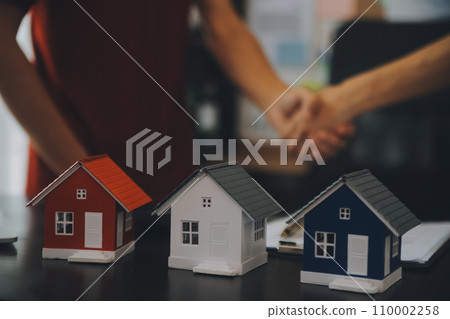 buy or sell real estate mortgage, Sale representative offer house purchase contract to buy a house or apartment and mortgage Money and Financial Concepts buy or sell real estate mortgage, Sale representative offer house purchase contract to buy a house or apartment and mortgage Money and Financial Concepts 110002258