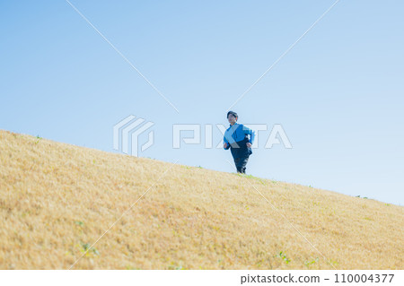 A man running on the riverbed A man running on the riverbed 110004377