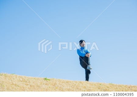 A man running on the riverbed 110004395