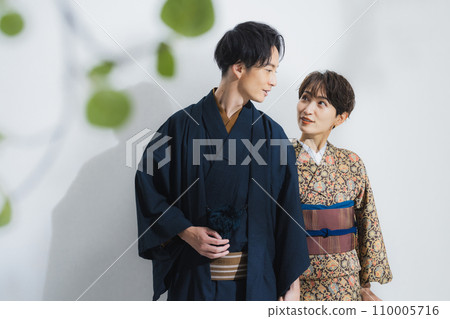 A man and a woman in kimono with umbrellas A man and a woman in kimono with umbrellas 110005716