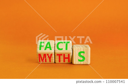 Facts or myths symbol. Concept word Myths and Facts. Beautiful orange table orange background. Business and facts or myths fact myth concept. Copy space. 110007541