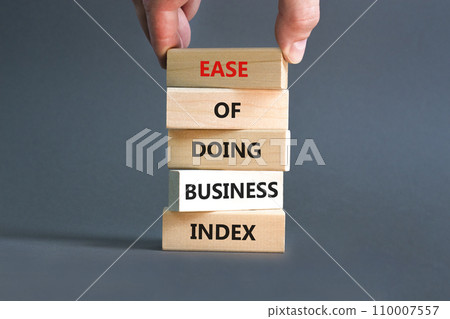 Ease of doing business index symbol. Concept words Ease of doing business index on wooden blocks. Beautiful grey table grey background. Business, ease of doing business index concept. Copy space. Ease of doing business index symbol. Concept words Ease of doing business index on wooden blocks. Beautiful grey table grey background. Business, ease of doing business index concept. Copy space. 110007557