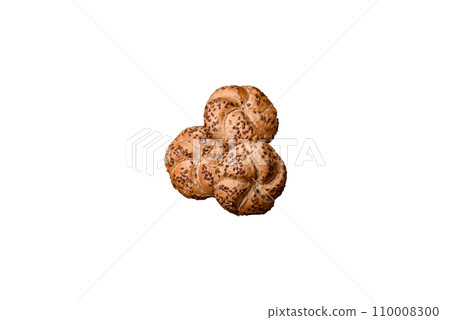 Delicious freshly baked crispy bun or kaiser roll with sesame seeds Delicious freshly baked crispy bun or kaiser roll with sesame seeds 110008300