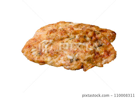 Delicious fried chicken breast in batter with mustard, salt, spices and cheese 110008311