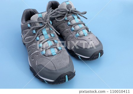 Hiking Male Trekking Footwear, Waterproof Non Slip Mountain Shoes, Adventurer Boots on Blue Background, Heavy-duty Tread Outsole. Man's Durable Synthetic Leather Outdoor Outfit For Sport 110010411