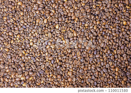Roasted coffee beans background. Whole coffee beans macro. Roasted coffee beans background. Whole coffee beans macro. 110011580