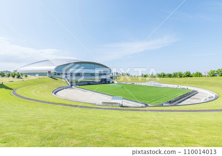Sapporo City, Hokkaido - Sapporo Dome on a sunny day where various events are held and a hovering soccer stage under maintenance 110014013