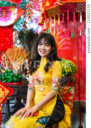 Beautiful Vietnamese woman in traditional vietnamese dress in Tet  Lunar New Year 110015210