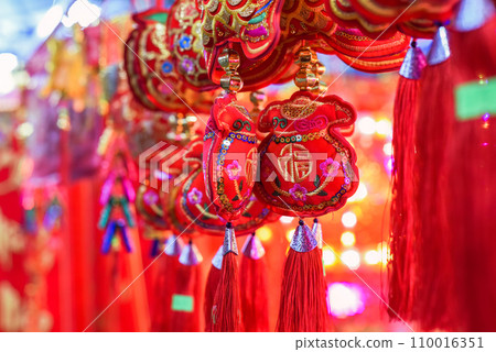 many decorations as symbol of wealth in the market for Tet Lunar New Year many decorations as symbol of wealth in the market for Tet Lunar New Year 110016351