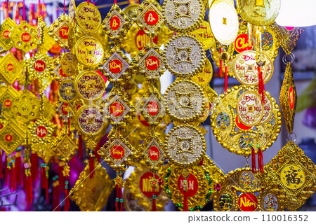 many decorations as symbol of wealth in the market for Tet Lunar New Year many decorations as symbol of wealth in the market for Tet Lunar New Year 110016352