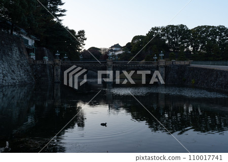 Stone bridge reflected in the moat of the Imperial Palace 110017741