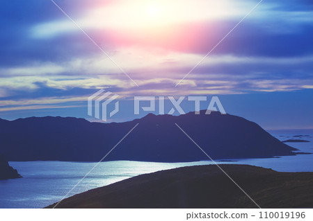 Beautiful rocky seascape in the evening. Rocks in the sea at sunset. Wilderness, beautiful nature of Norway Beautiful rocky seascape in the evening. Rocks in the sea at sunset. Wilderness, beautiful nature of Norway 110019196