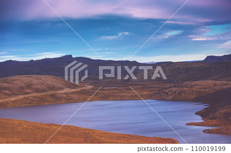 Beautiful rocky seascape in the evening. Rocks in the sea at sunset. Wilderness, beautiful nature of Norway Beautiful rocky seascape in the evening. Rocks in the sea at sunset. Wilderness, beautiful nature of Norway 110019199