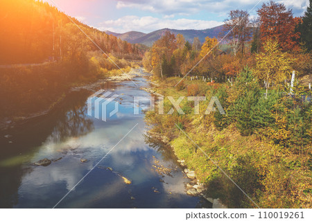 Mountain river on an autumn sunny day. Nature landscape. Carpathian Mountains, Ukraine Mountain river on an autumn sunny day. Nature landscape. Carpathian Mountains, Ukraine 110019261