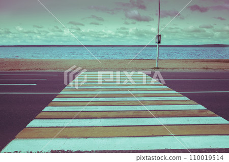 Pedestrian crossing to the sea. A sidewalk. Vintage color 110019514