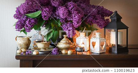 Still life from food and lush lilac boquet Still life from food and lush lilac boquet 110019623