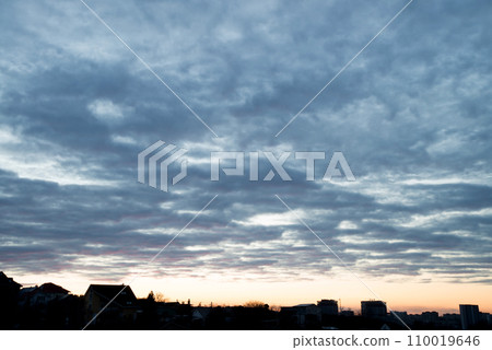 Bright clouds in the evening sky Bright clouds in the evening sky 110019646