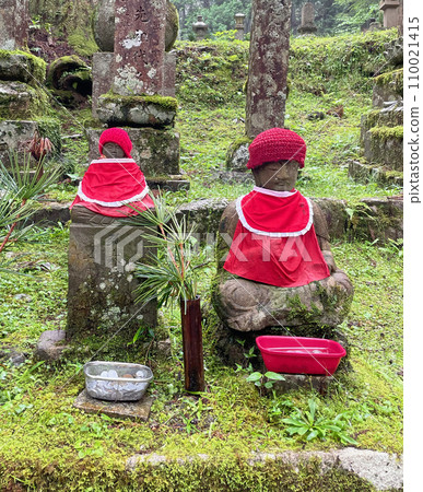 Jizo statue in red apron Mt. Koya Okunoin Jizo statue in red apron Mt. Koya Okunoin 110021415