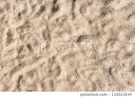 Fine sand with many foot step on beach 110021634