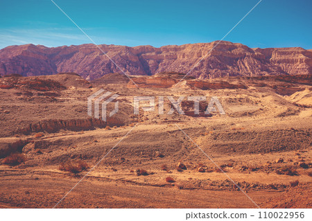 View of the desert. View of the valley with mountains on the backdrop. Timna Park, Eilat, Israel View of the desert. View of the valley with mountains on the backdrop. Timna Park, Eilat, Israel 110022956